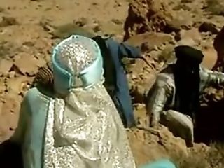 Arab Woman In The Desert Having Hook-up With A Group Of Dudes